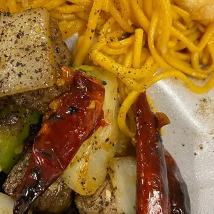 Shaken beef w garlic noodles but my fried. Gave me all the Chili's from her Kung Pao.