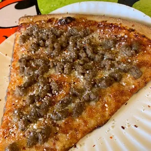 Slice of pizza with beef