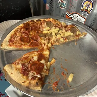 Half pepperoni, half pineapple and Italian sausage.