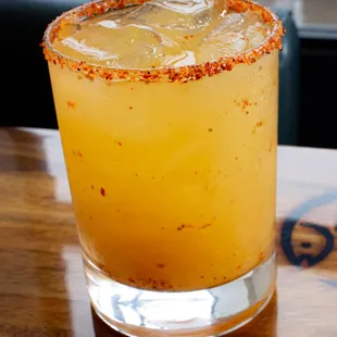 a cocktail in a glass on a table