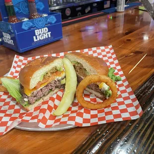 a sandwich and onion rings