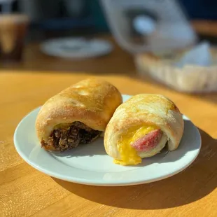 two sausage wrapped in bread