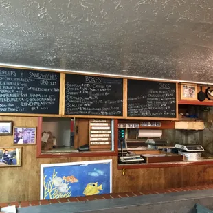 menus on the wall of the restaurant