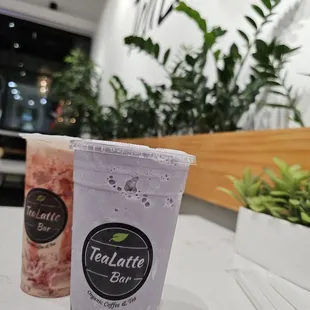 Taro Smoothie with boba and Strawberry Flow with coconut jellies