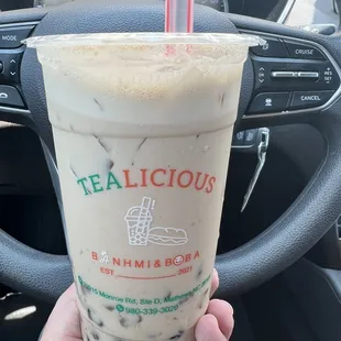 Lavendar milk tea with boba and lychee jelly.