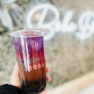 Passion fruit black ice tea with tapioca pearls