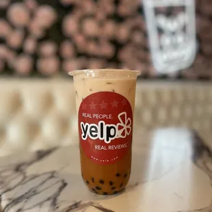 a cup of coffee on a table