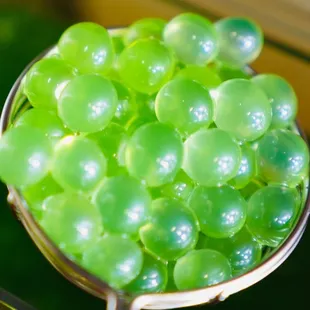  spoon full of green beads