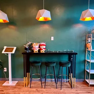 a bar with stools and shelves