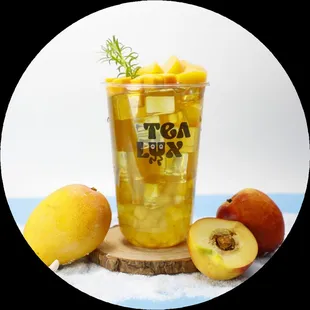 a glass of iced tea with fruit