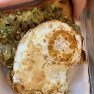 Avocado toast with fried egg