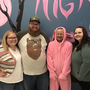 You cant tell by the photo but they all bullied him into being the suit-wearer. (They also drove from 2 hours away!)