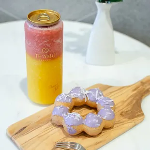 a donut and a jar of juice