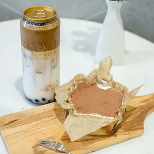 a cup of coffee and a sandwich