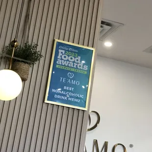 a sign on the wall of a restaurant