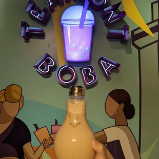 Creme brulee milk tea in a lightbulb cup