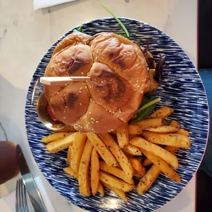 Shrimp burger with fries