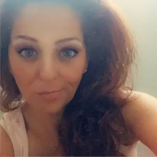 Mandi E.