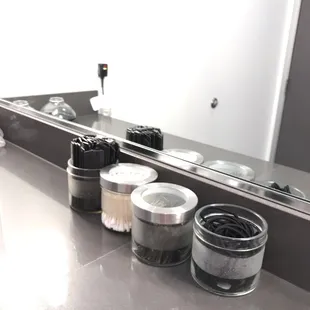 Hair ties, bobby pins, combs are provided in the locker room