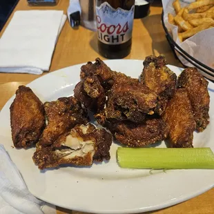 Hard crunchy overcooked garlic parm wings. Both orders came out like this.