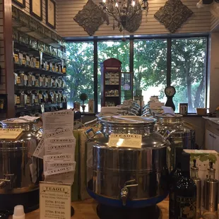 a display of teapots and teapots in a tea shop