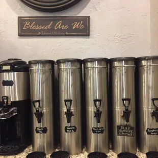 a variety of coffee urns on a counter