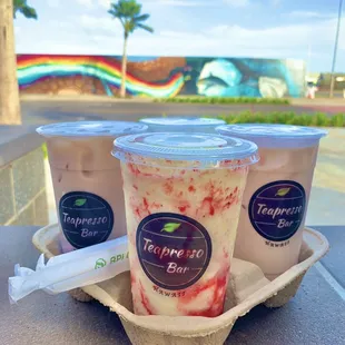 Lava flow smoothie, ube milk tea, and strawberry flow milk tea