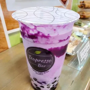 Ube latte. Half sweet.