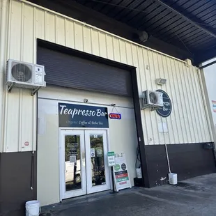 Entrance from the road. Not much parking, but street is fine.