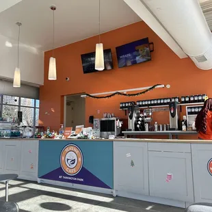 a woman standing at the counter