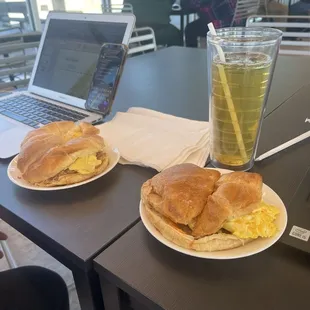 chicken, egg and cheese on croissant (left), turkey sausage, egg and cheese on croissant (right)