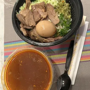 Spicy Beef Ramen takeout. Plenty of beef and noodles. Broth was at spicy.