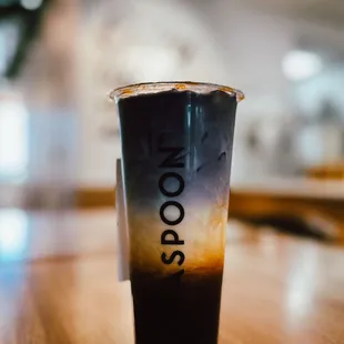 a cup of coffee on a table