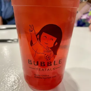 Lemonade punch with dragon fruit, raspberry, strawberry popping boba.