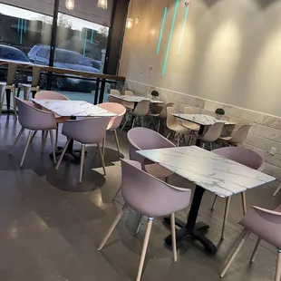 ables and chairs in a restaurant