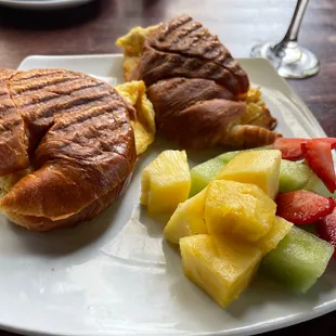 Crab &amp; egg croissant sandwich with fruit