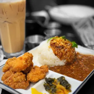 RE04. Popcorn Chicken with Marinated Minced Pork Sauce over Rice