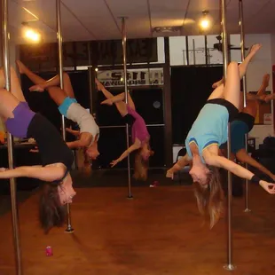 Advanced Pole Dancers! We offer spins and keep the level appropriate for beginners during classes and parties.