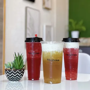 three drinks on a table