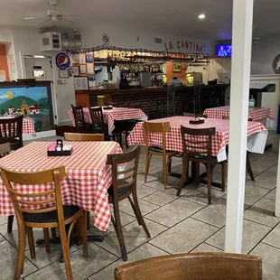 tables with red and white checkered tablecloths