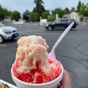 Snow cap- watermelon shave ice topped with condensada! Yum and the smiles are free!