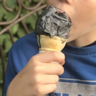 Stranger Things cone - murky marshmallow ice cream with Eggo waffles, Christmas sprinkles, and cocoa krispies.