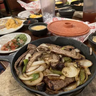 Steak fajita for two! We each got our own plates of rice/beans &amp; additionals