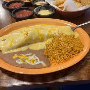 Burrito dinner plate with shredded chicken.