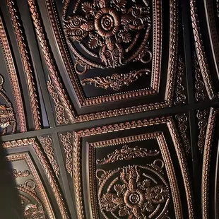 a close up of a decorative ceiling