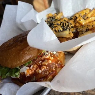 Umami Fries and single burger with red, hot &amp; bleu toppings