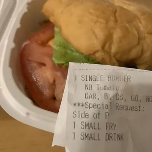 a sandwich in a styrofoam container