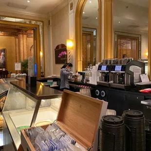 a display of coffee and pastries