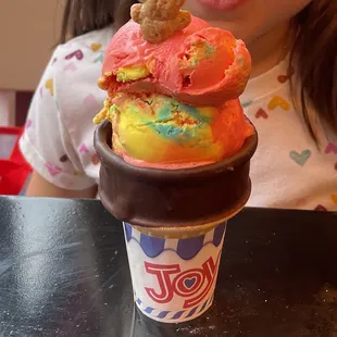 Kid's scoop of Superman in dipped cake cone