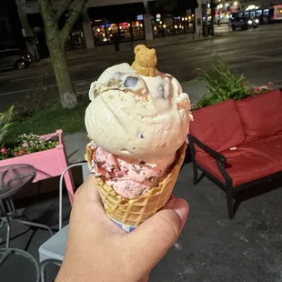 Waffle cone with amaretto cherry and chocolate chip cookie dough ice cream